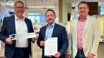 Gruppenbild von Jochen Protzer (WFG), Dr. Guido Grohmann, Matthias Friedrich (TraFoNetz)